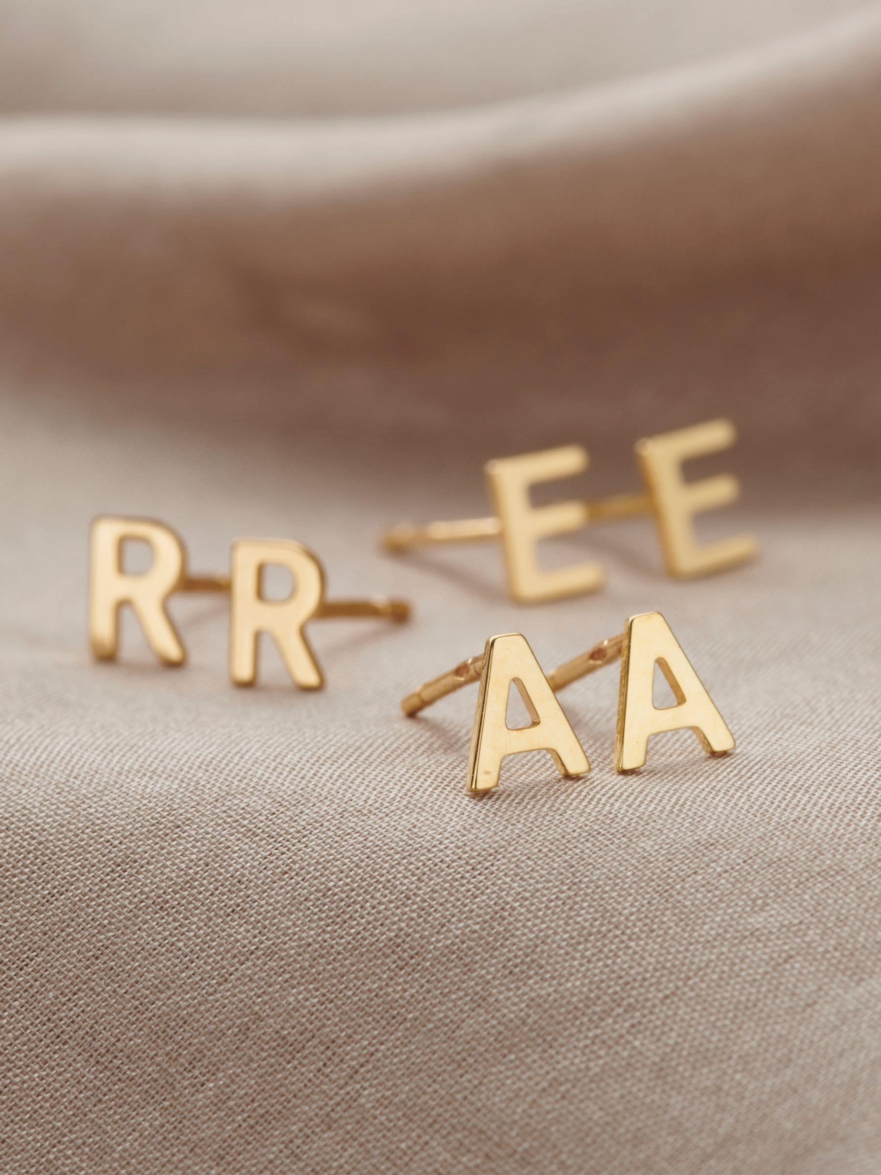 Posh Totty Designs petite 9ct gold initial stud earrings (British brand)