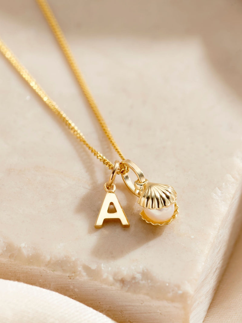 Posh Totty 9ct initial pearl pendant, imported from the UK