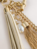 Gold beaded shell bag charm with tassel and pearls, imported from UK
