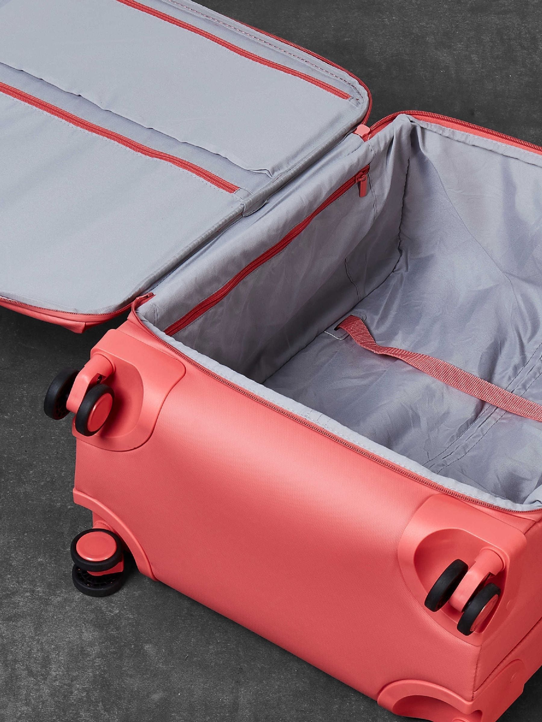 Rock Luggage large suitcase coral orange 104L, imported from the UK