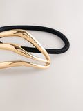 Gold tone metal hair bobble with sculptural design, UK version