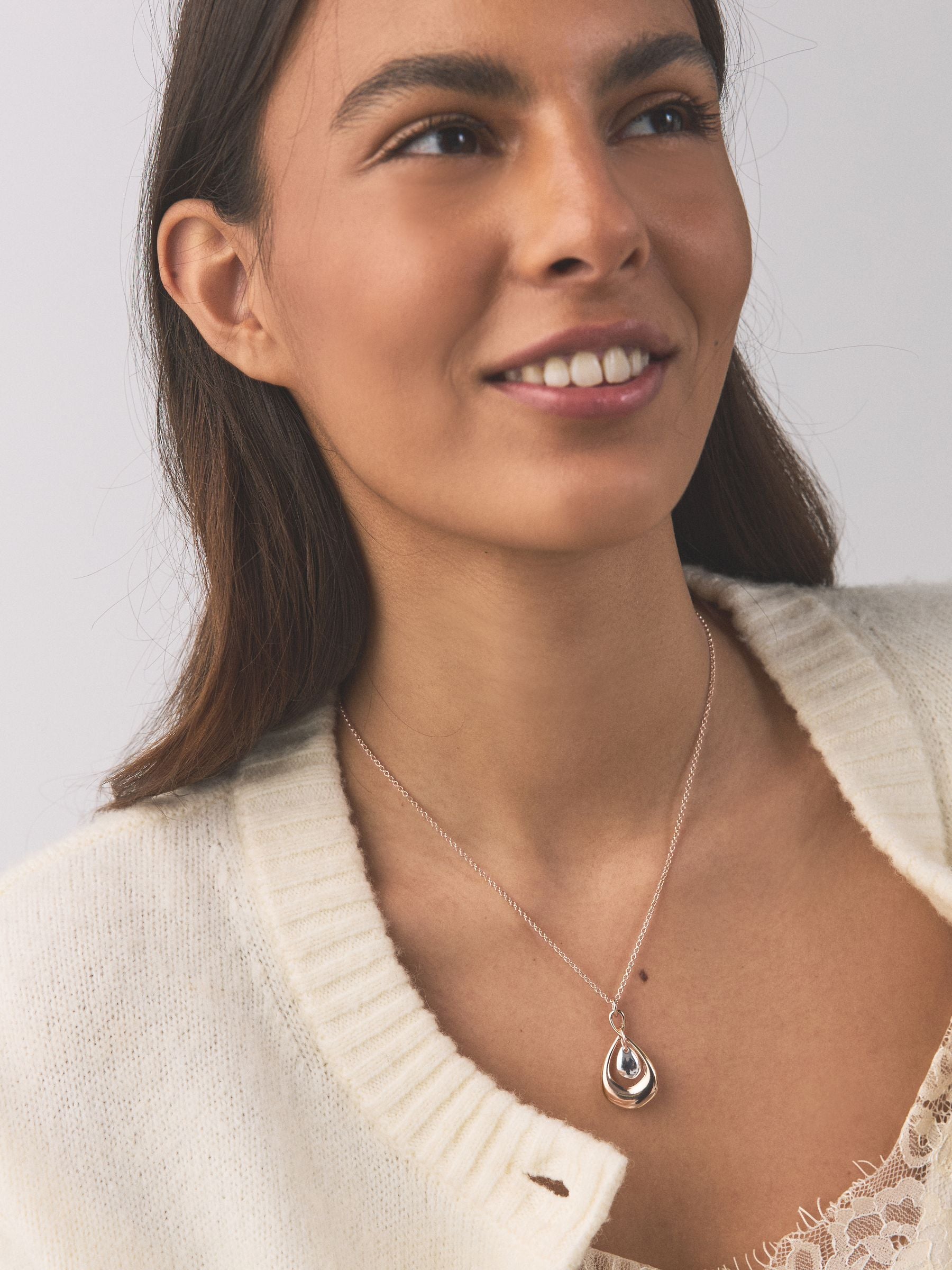 Mixed metal pendant necklace with silver and gold tones - British product
