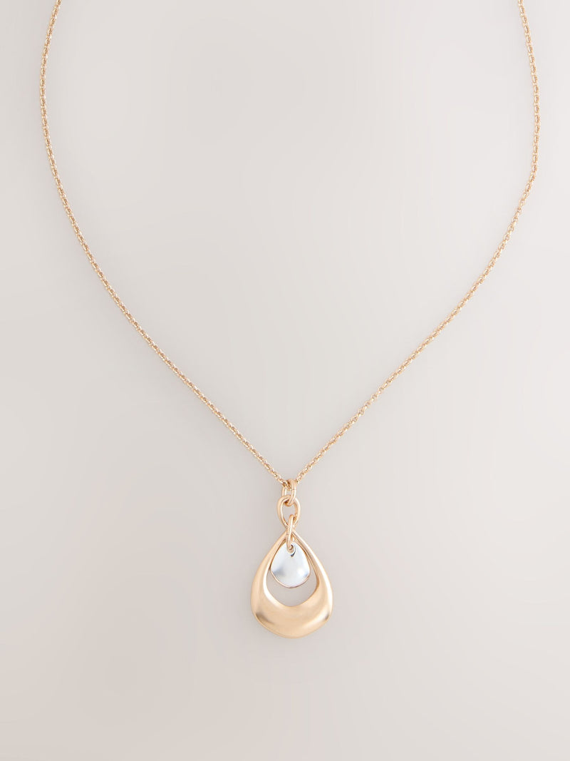 Mixed metal pendant necklace with silver and gold tones - British product