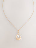 Mixed metal pendant necklace with silver and gold tones - British product