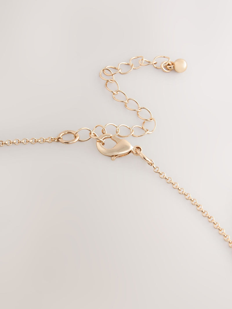 Mixed metal pendant necklace with silver and gold tones - British product