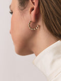 Silver tone mixed metal hoop earrings, imported from the UK