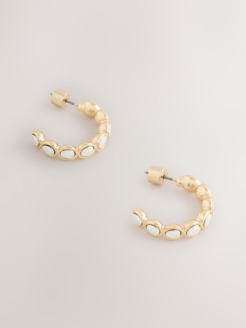Silver tone mixed metal hoop earrings, imported from the UK