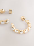Silver tone mixed metal hoop earrings, imported from the UK