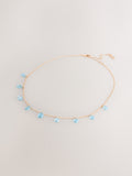 Gold tone gemstone drop necklace with turquoise beads - British product
