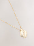 Gold tone organic pendant necklace with recycled metal, UK version