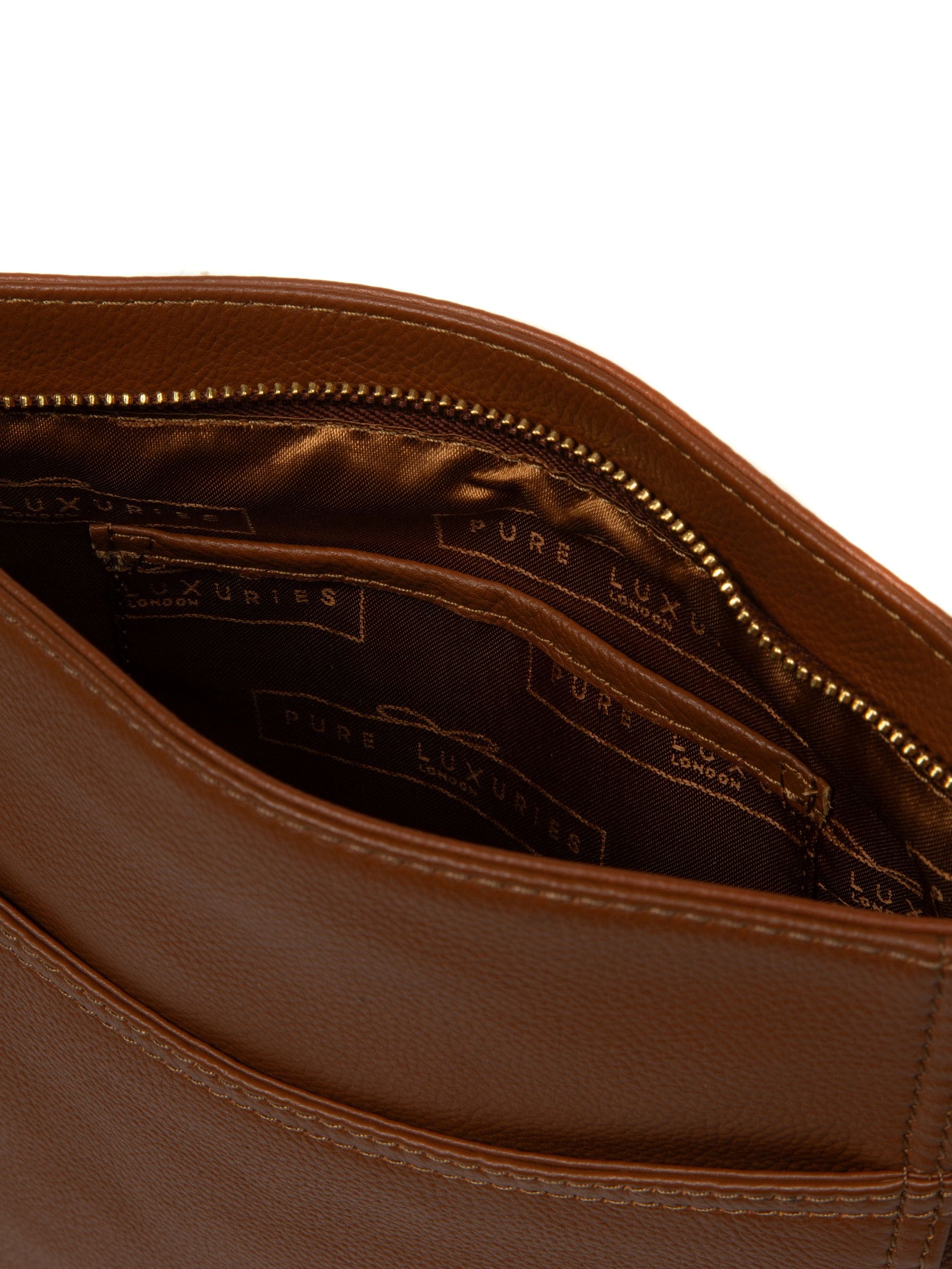 Pure Luxuries London black leather cross-body bag, imported from the UK