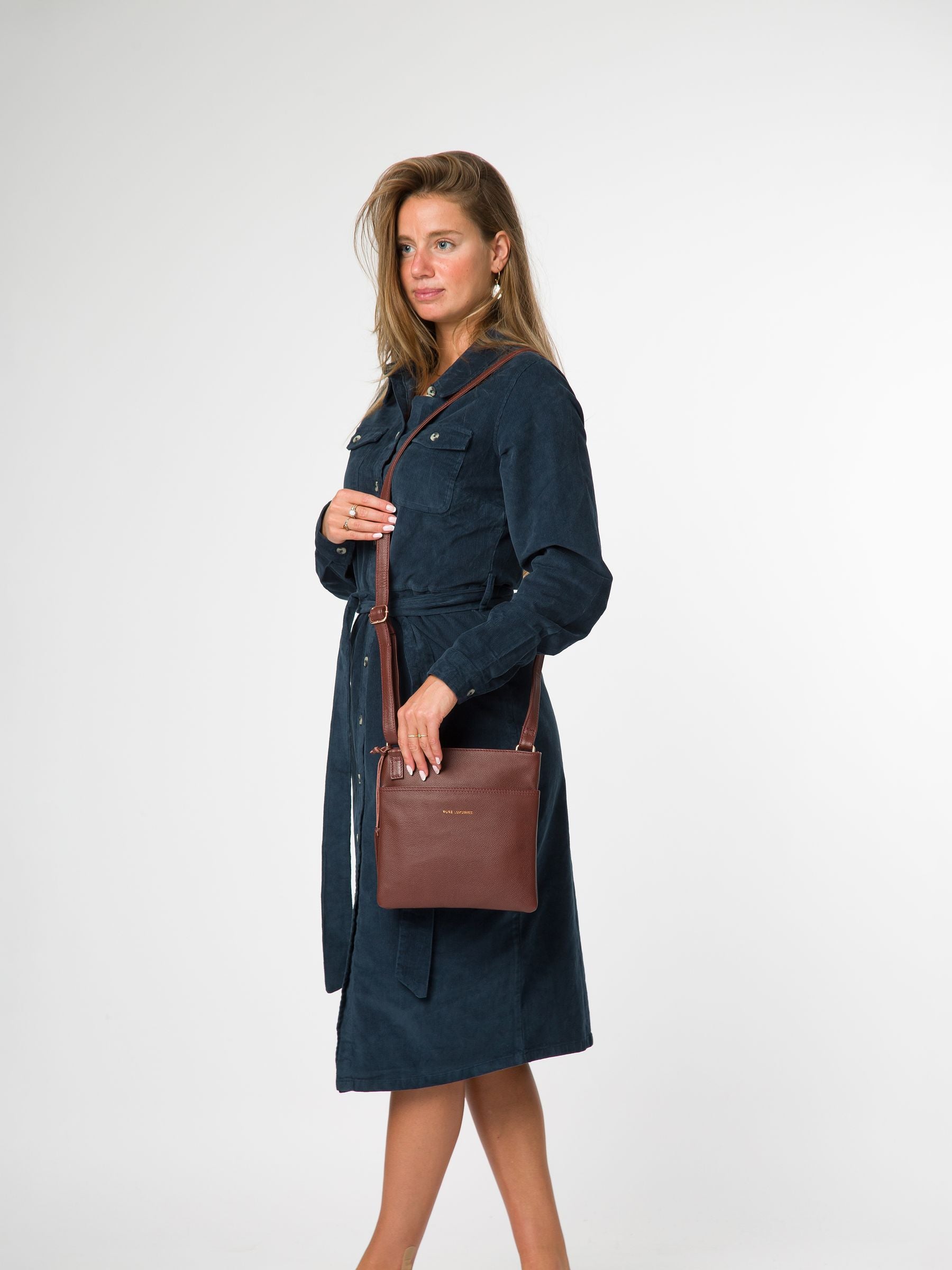 Pure Luxuries London Nola brown cross-body bag (British brand)