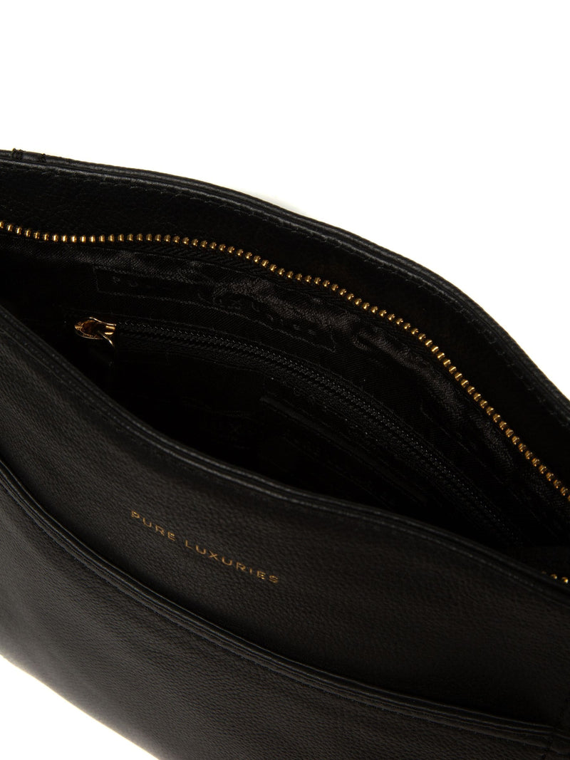 Pure Luxuries London black leather cross-body bag, imported from the UK