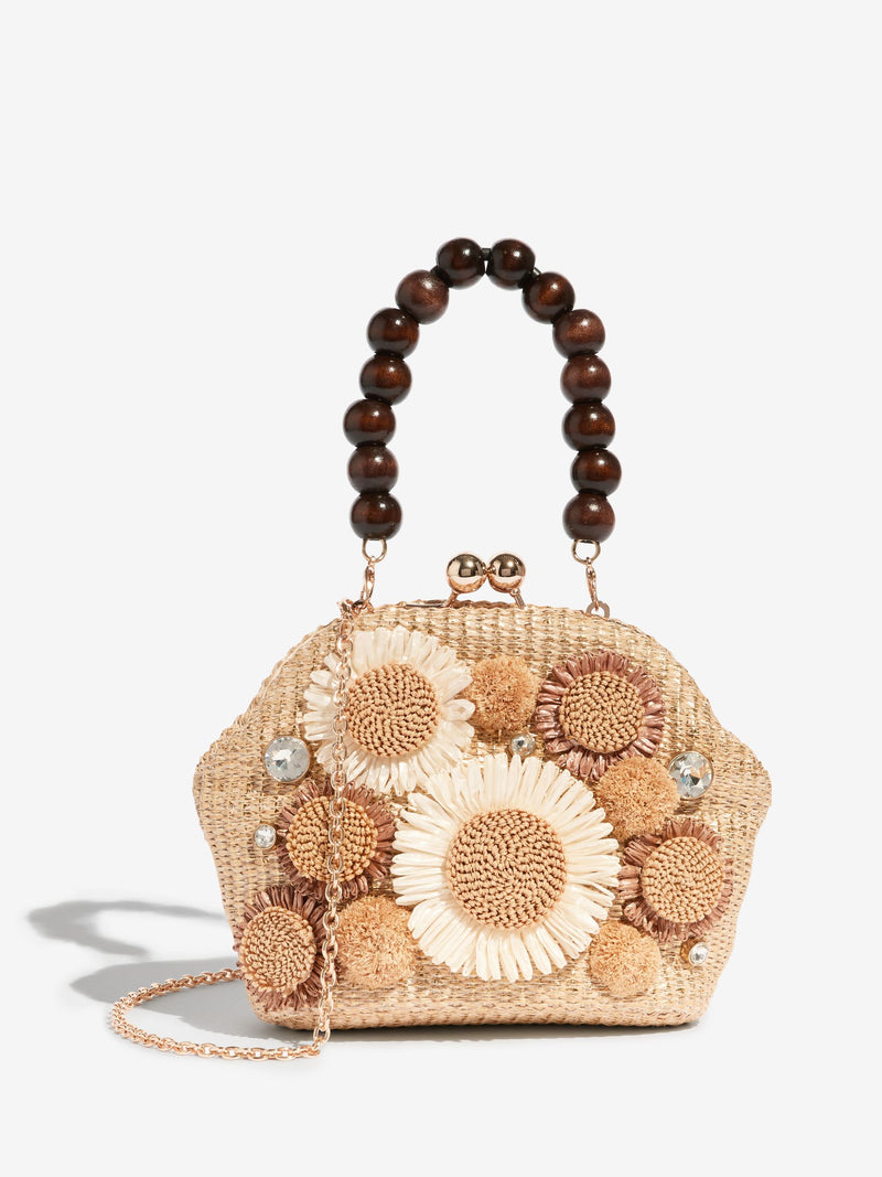 Natural raffia top handle clutch bag with 3D flower, imported from the UK