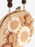 Natural raffia top handle clutch bag with 3D flower, imported from the UK