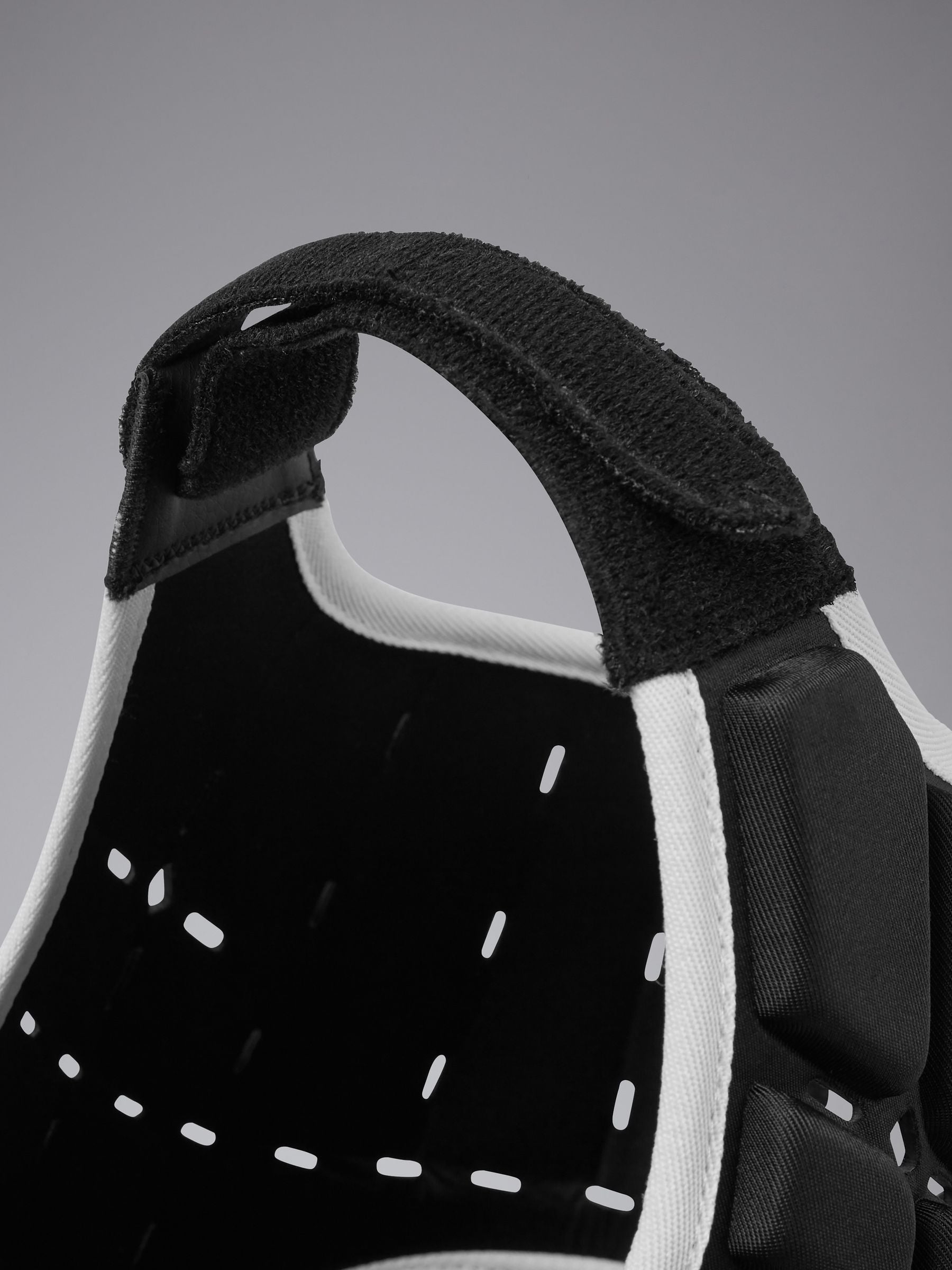 Canterbury Core headguard in black with EVA foam protection, UK version