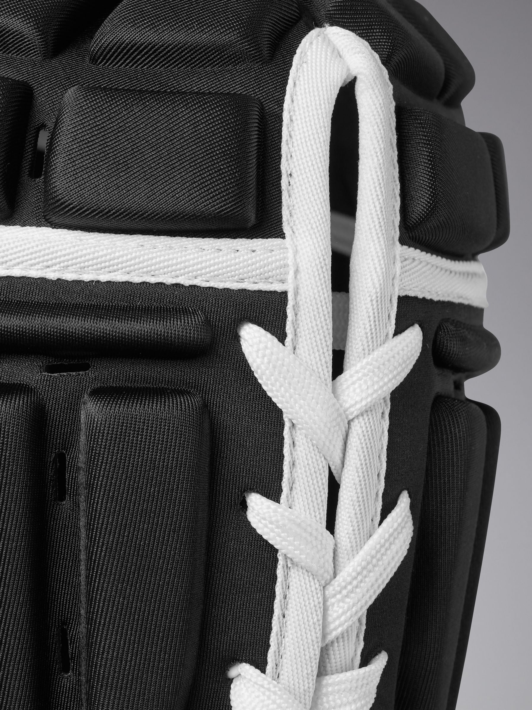 Canterbury Core headguard in black with EVA foam protection, UK version