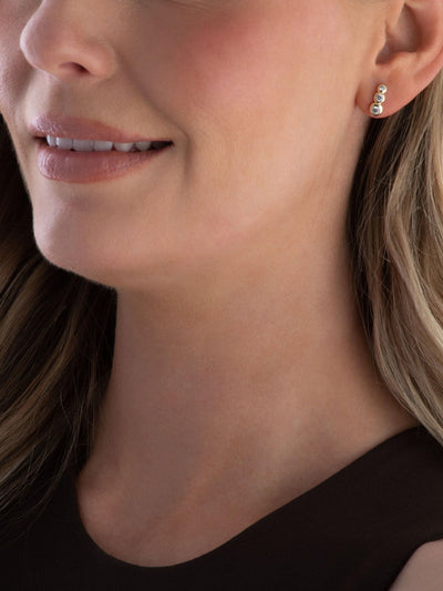Next Beaverbrooks Gold 9ct Cubic Zirconia Swirl Stud Earrings- Buy online at McGrocer