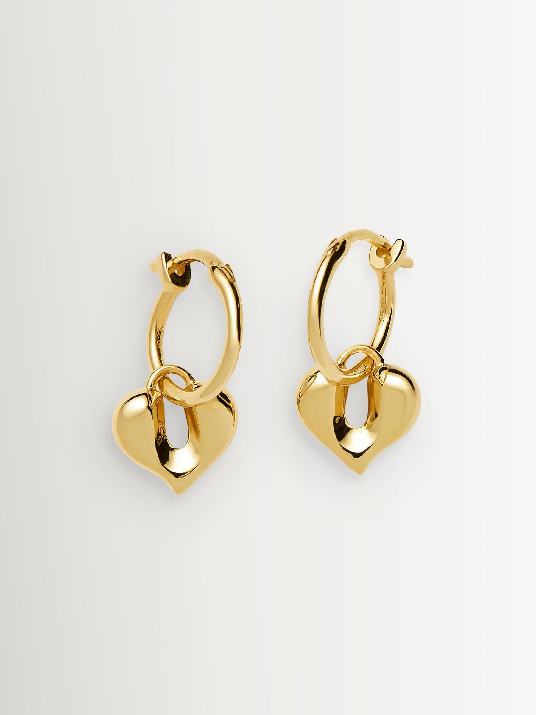 Missoma gold tone molten heart charm hoop earrings - British product