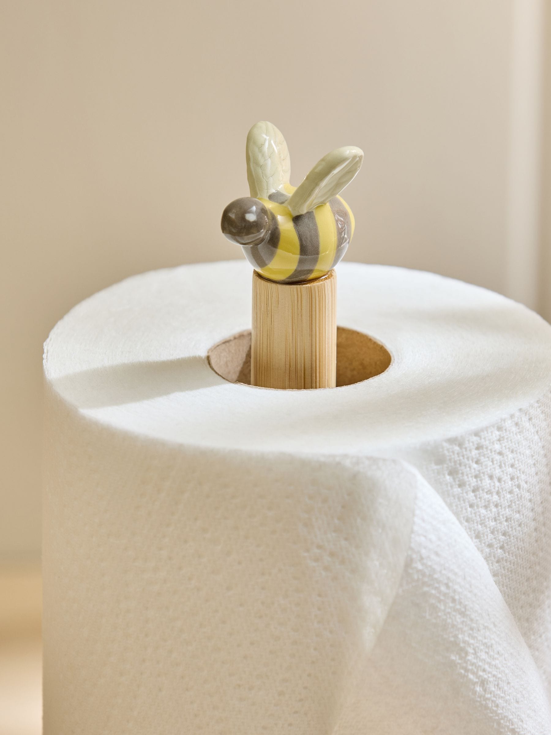 Maisie yellow stoneware kitchen roll holder, imported from the UK