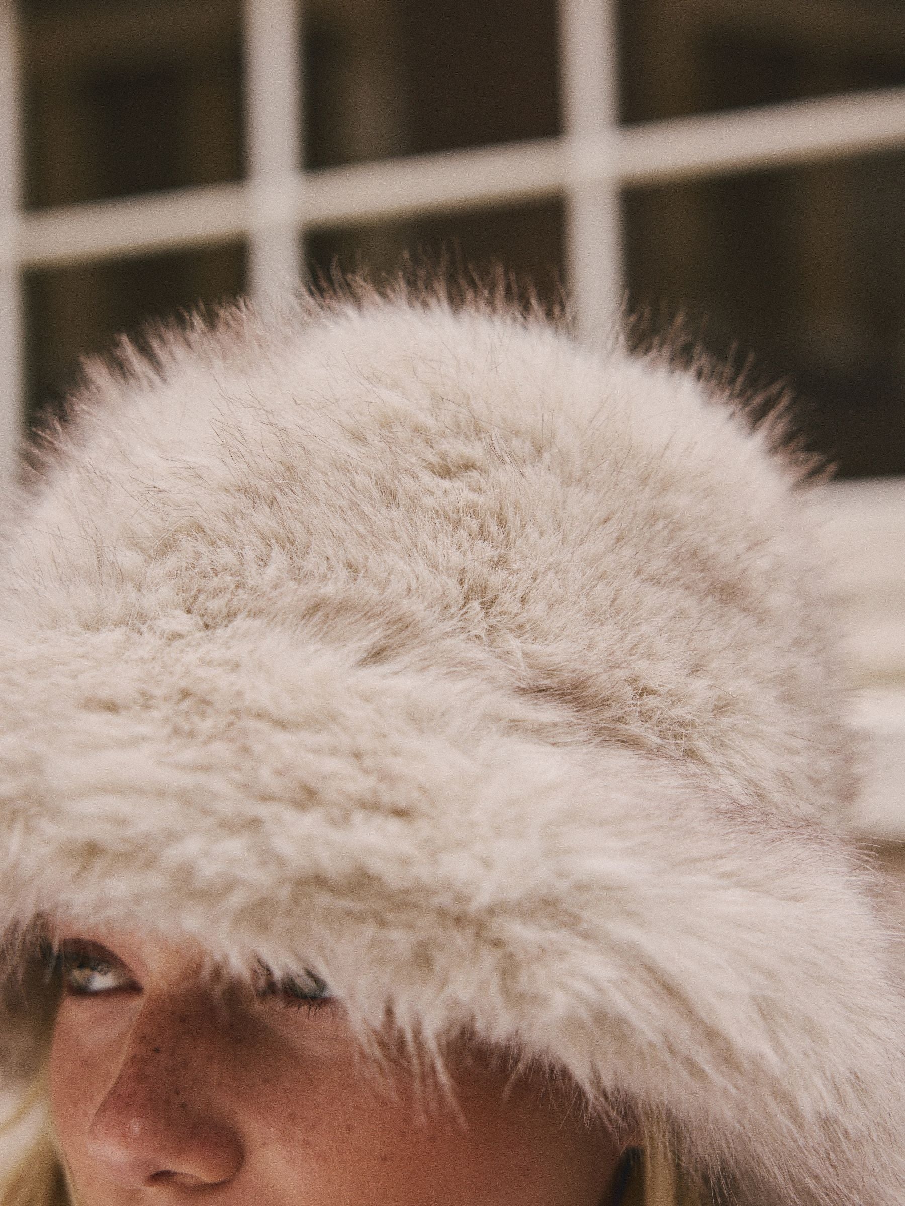Neutral faux fur bucket hat 100% recycled polyester, UK version