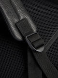 Duchamp black leather backpack with laptop sleeve, imported from the UK