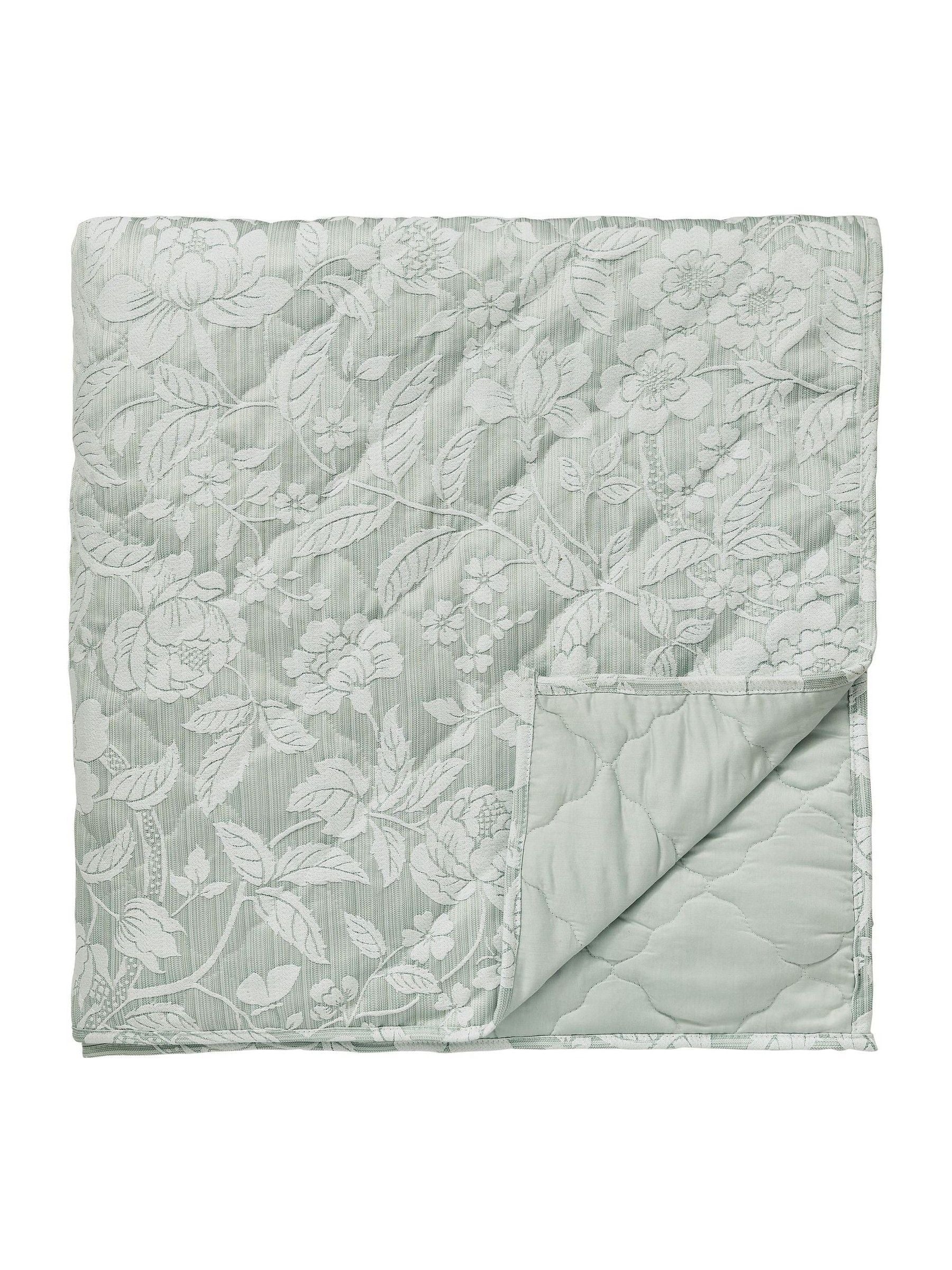 Sanderson Aqua Pyramus quilted throw in jacquard, imported from the UK