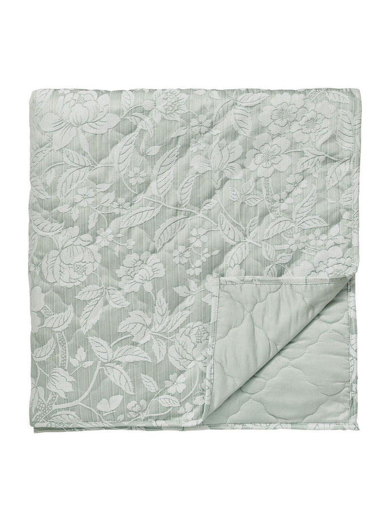 Sanderson Aqua Pyramus quilted throw in jacquard, imported from the UK
