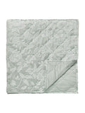 Sanderson Aqua Pyramus quilted throw in jacquard, imported from the UK