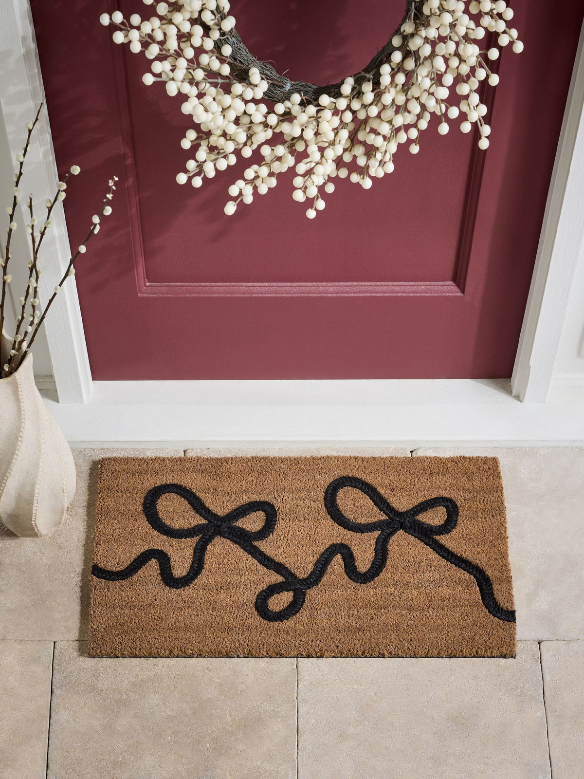 Black braided bow coir doormat, UK version