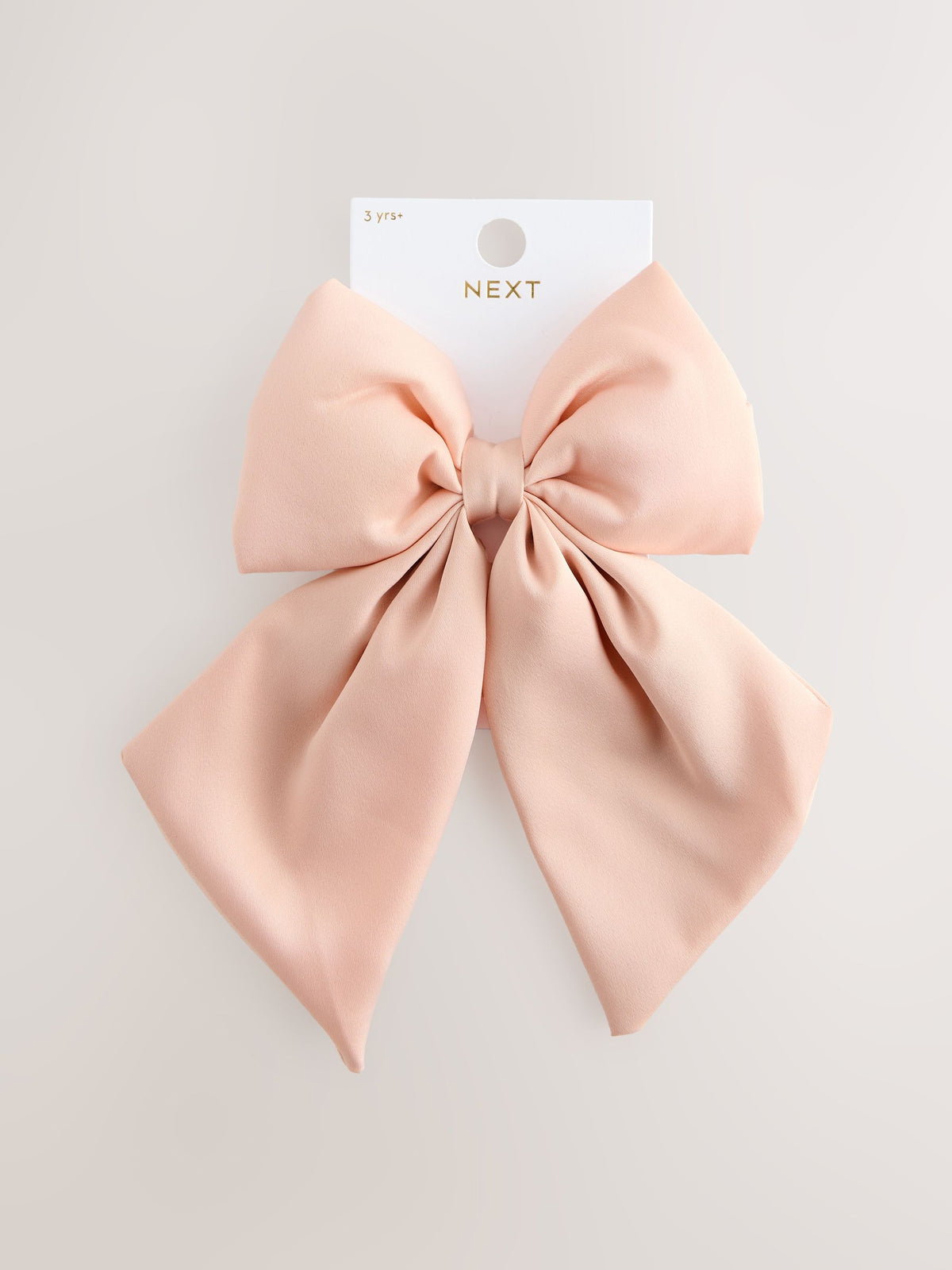 Pink statement bow hair clip, UK version