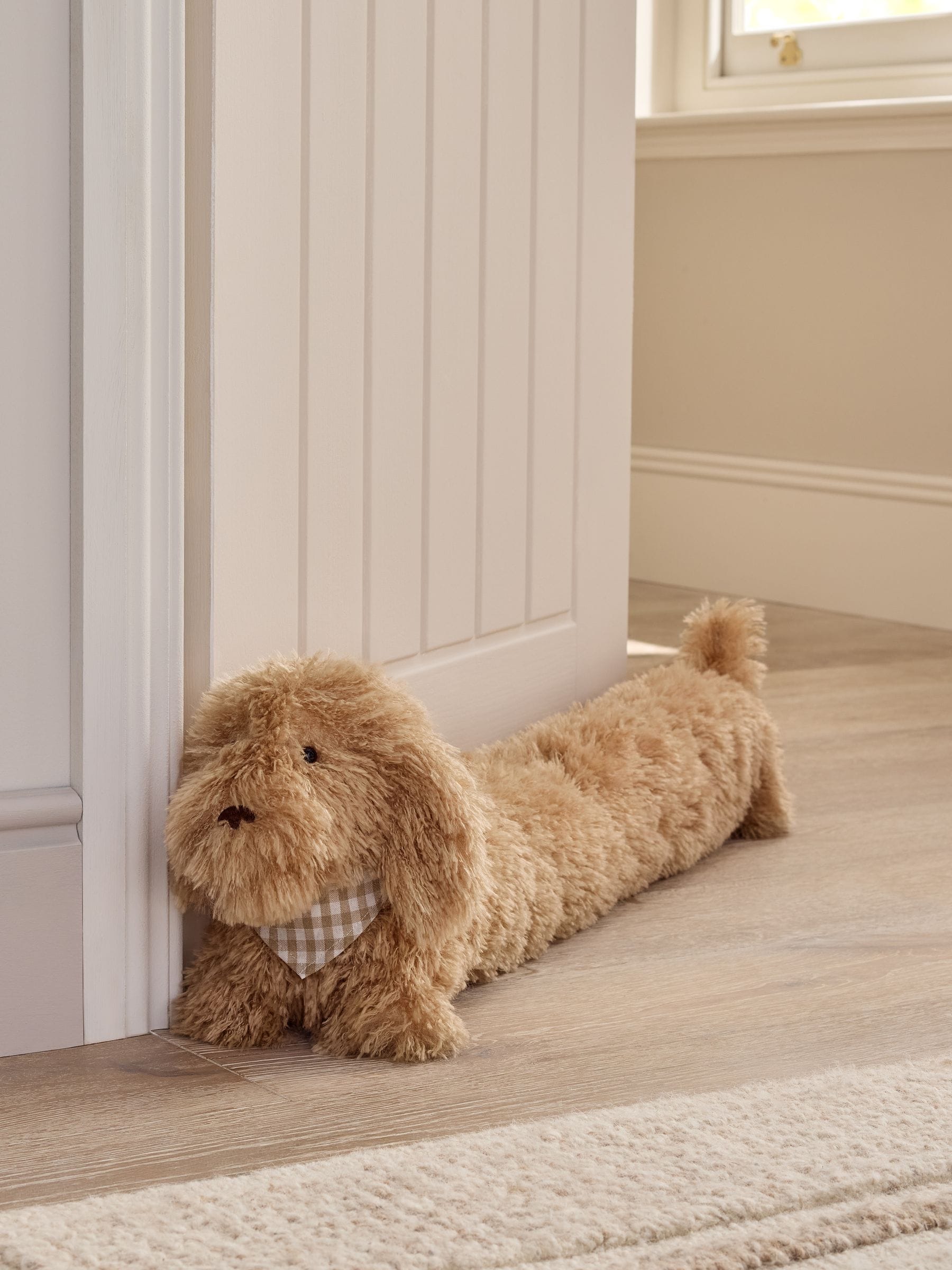 Natural Louis the Labradoodle draught excluder, British product