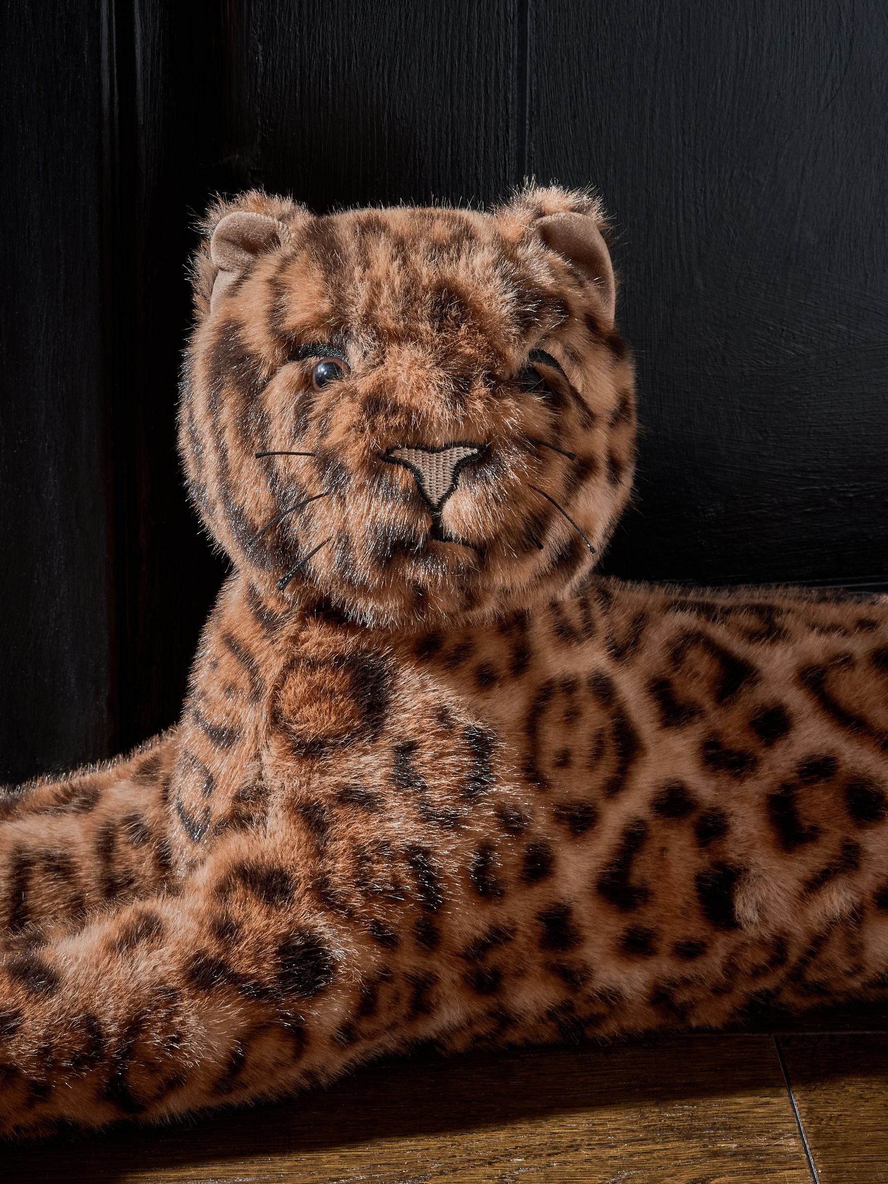 Faux fur leopard draught excluder, imported from the UK