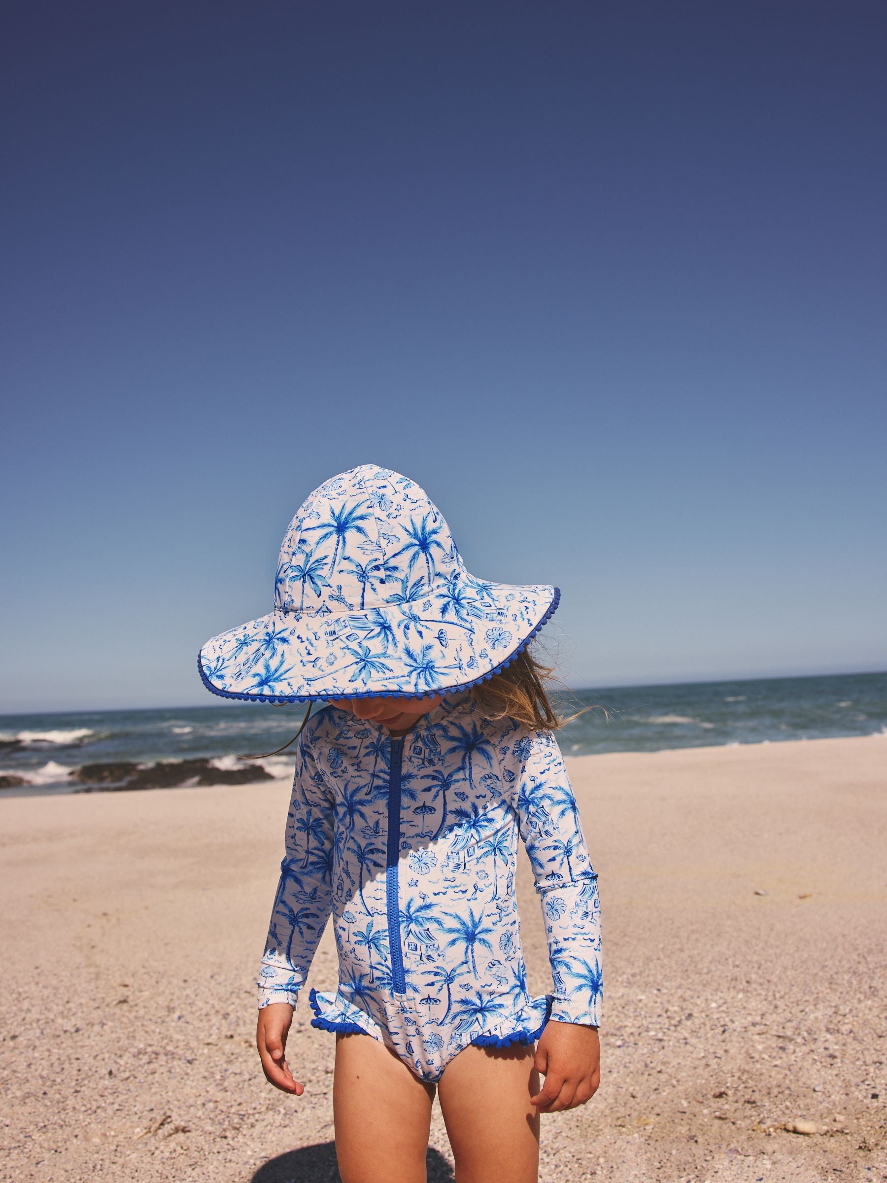 Blue palm print swim hat UPF 50+ for children - British product