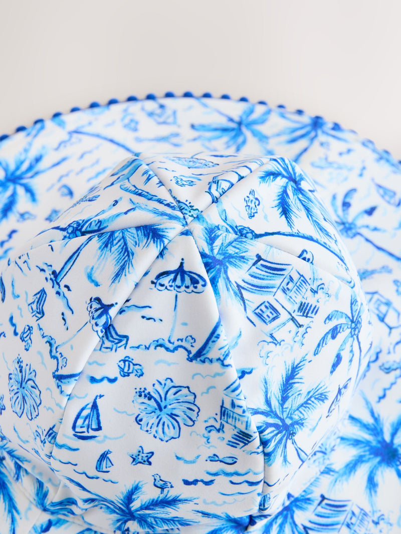 Blue palm print swim hat UPF 50+ for children - British product