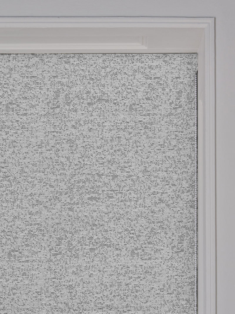 Light grey bouclé roman blind with blackout thermal lining (British brand)