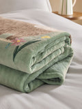 Sage green Hamish Highland Cow floral fleece throw (British brand)