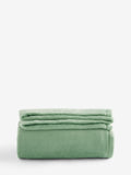 Sage green Hamish Highland Cow floral fleece throw (British brand)