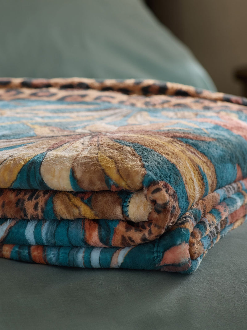 Tropical print fleece throw teal blue (British brand)