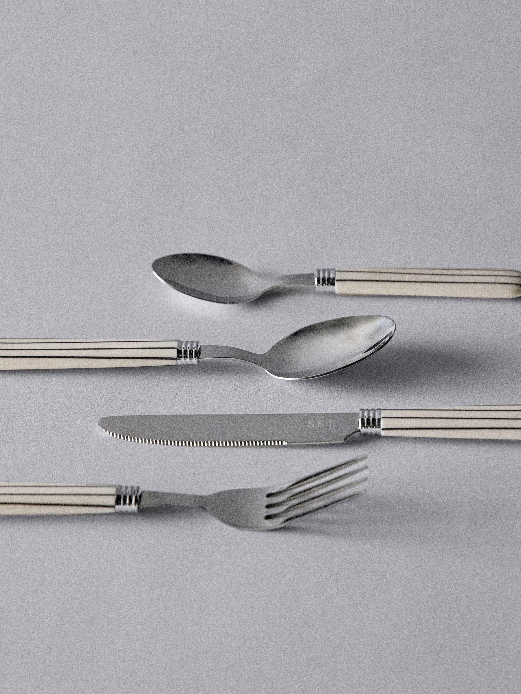 The Set Natural Striped 24 piece cutlery set, imported from the UK