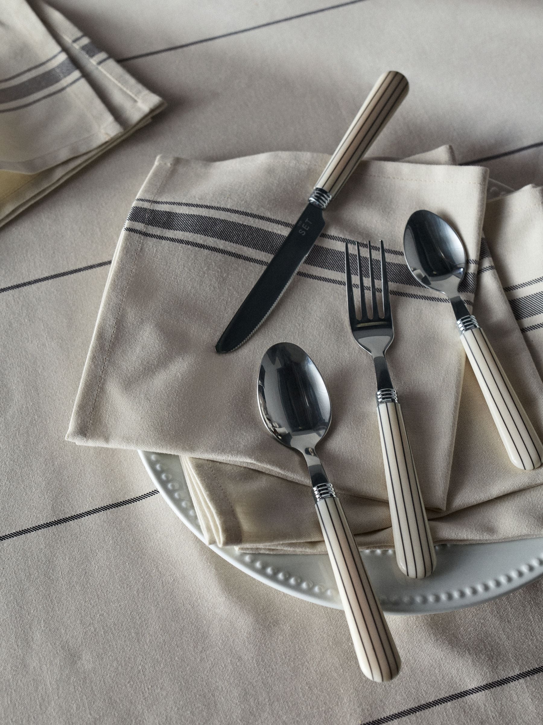 The Set Natural Striped 24 piece cutlery set, imported from the UK