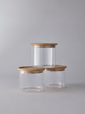 The Set clear glass stacking jars with wooden lids imported from UK