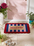 Coir doormat with scallop edge and welcome design - British product