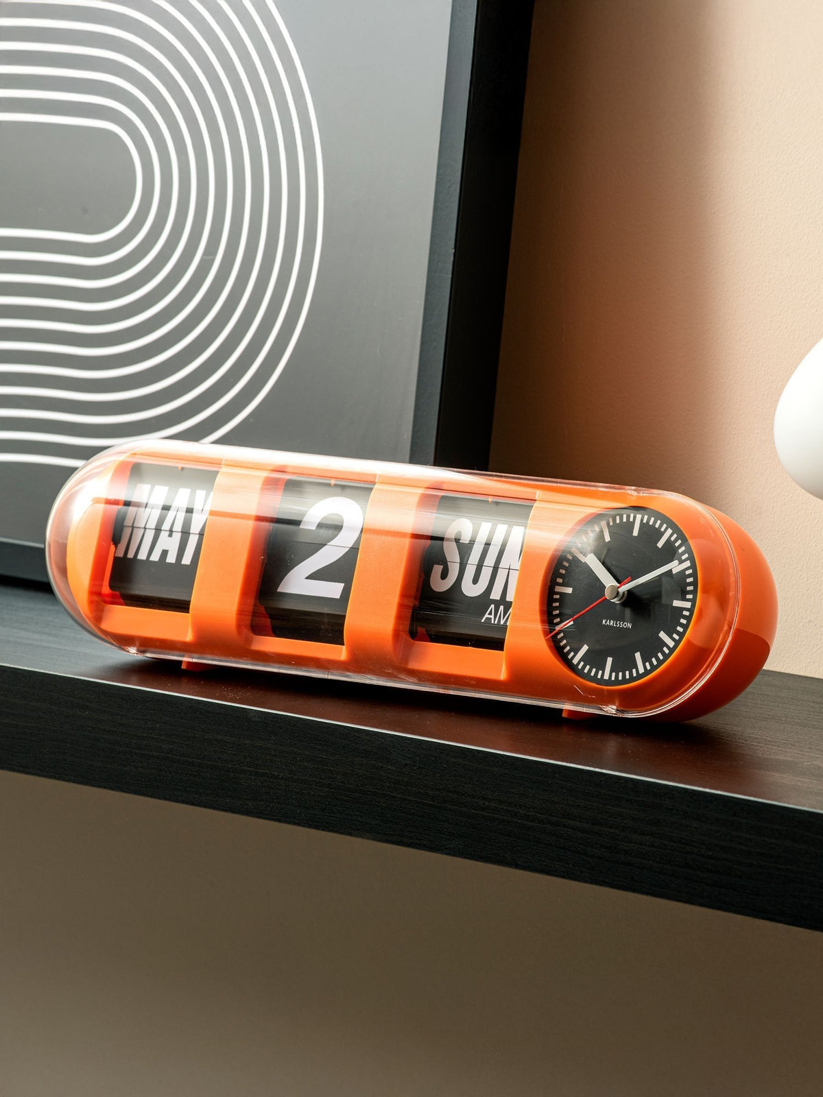 Karlsson Orange Tube Flip wall clock, imported from the UK