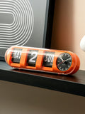 Karlsson Orange Tube Flip wall clock, imported from the UK