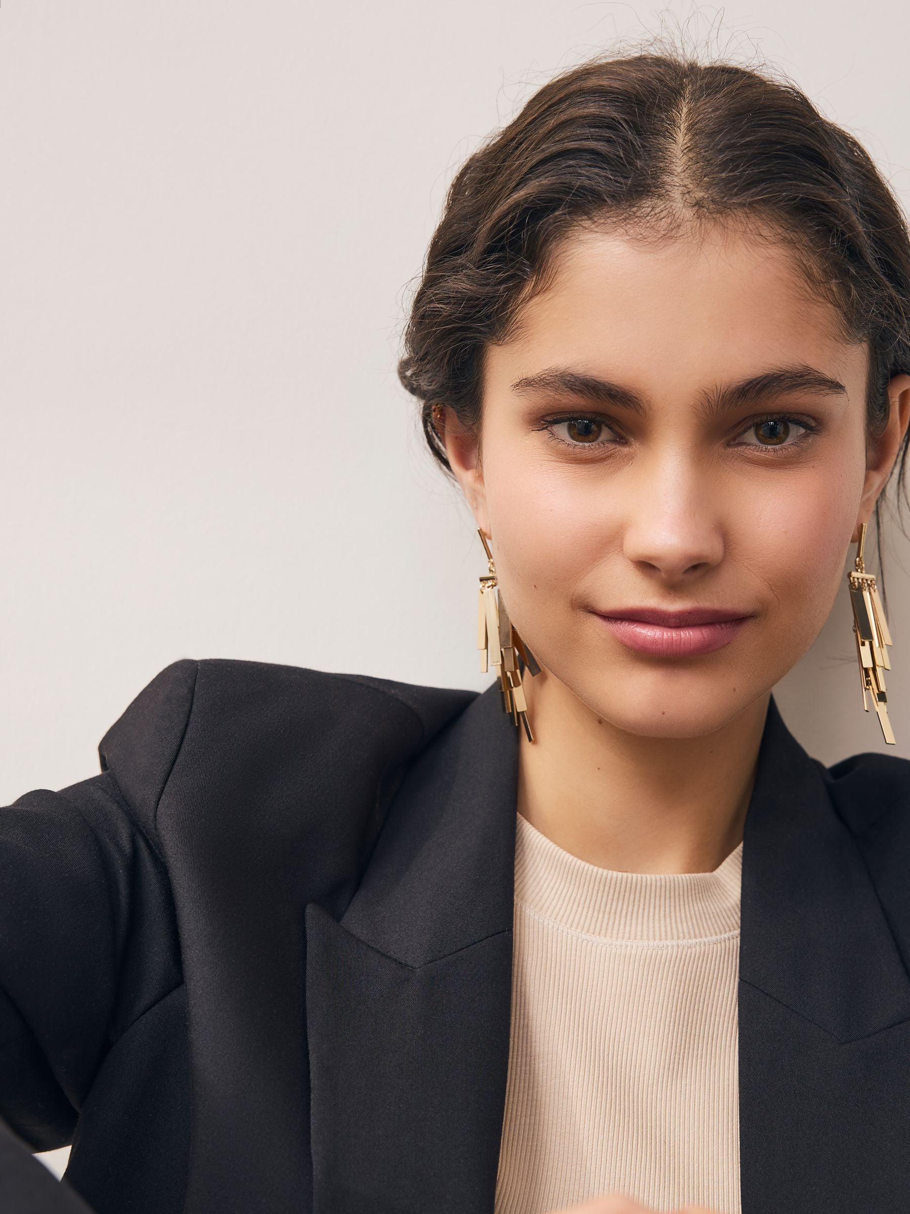Gold tone fan cascade statement pierced earrings - British product