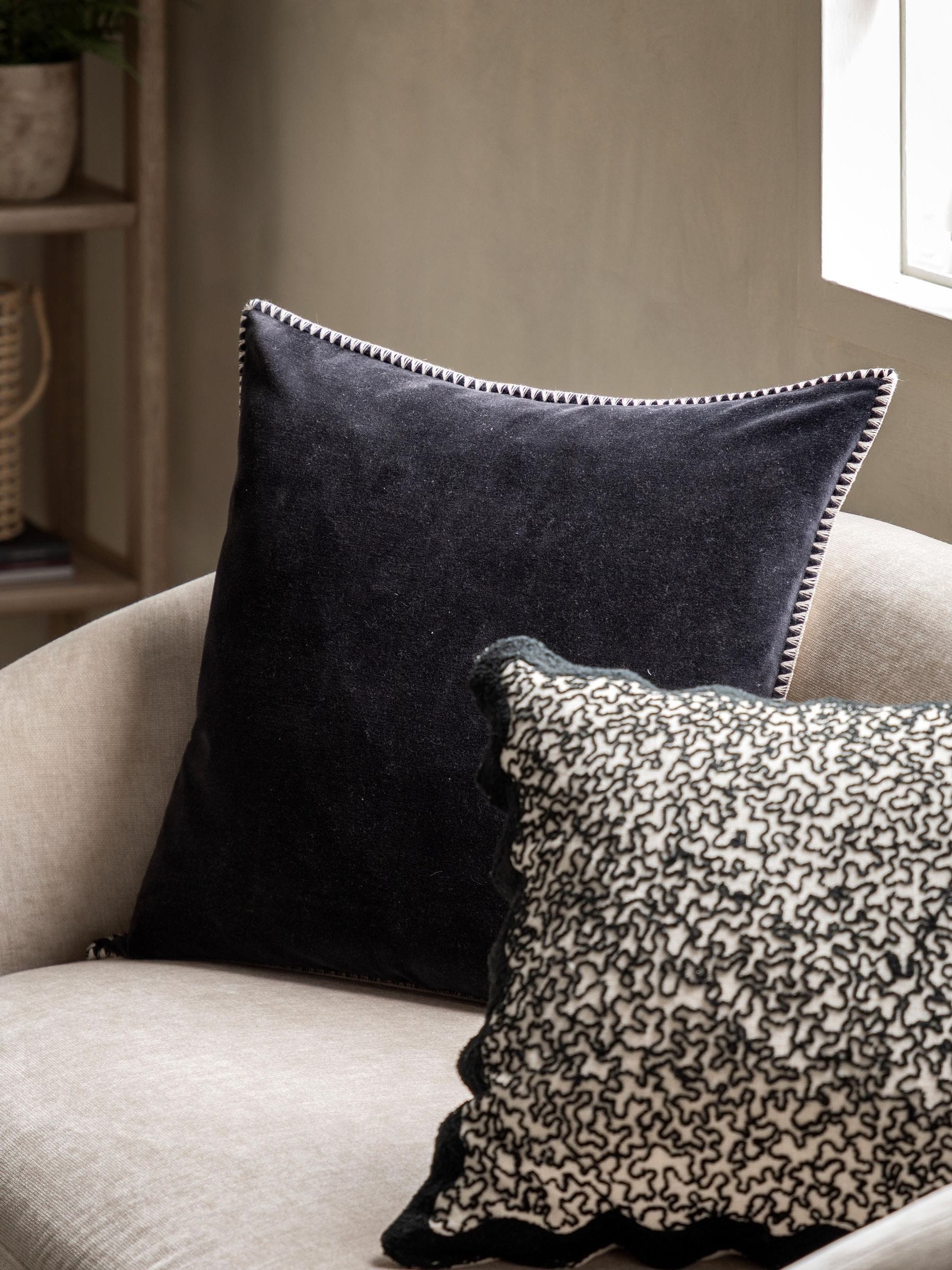 Gallery Home black velvet cushion 50cm, imported from the UK