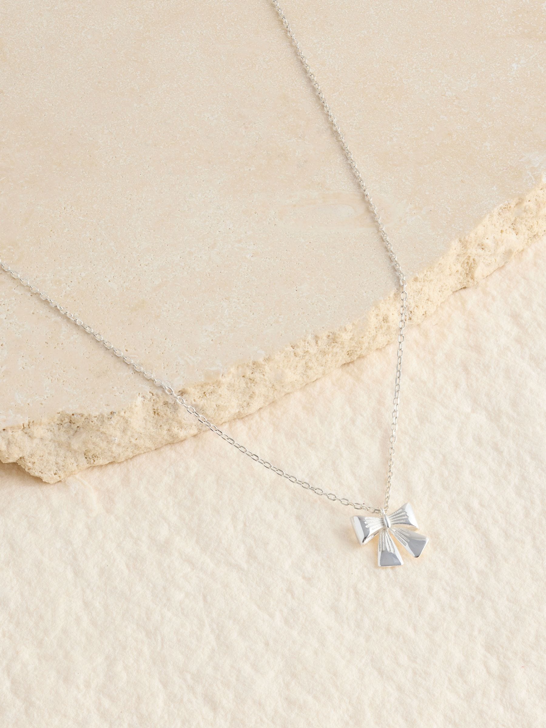 Silver Tone Sterling Bow Charm Necklace, UK version
