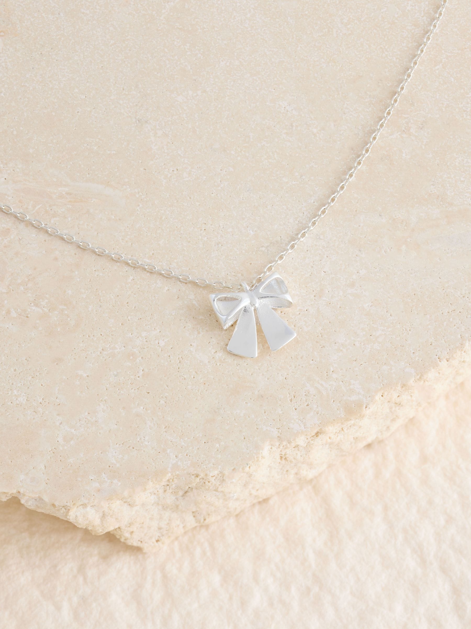 Silver Tone Sterling Bow Charm Necklace, UK version