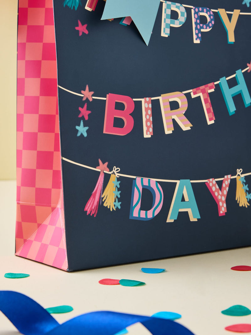 Navy medium bunting gift bag set with tissue paper and card, UK version